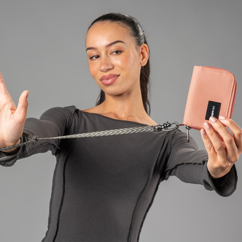 Portfel antykradzieżowy mały RFID Pacsafe - różowy