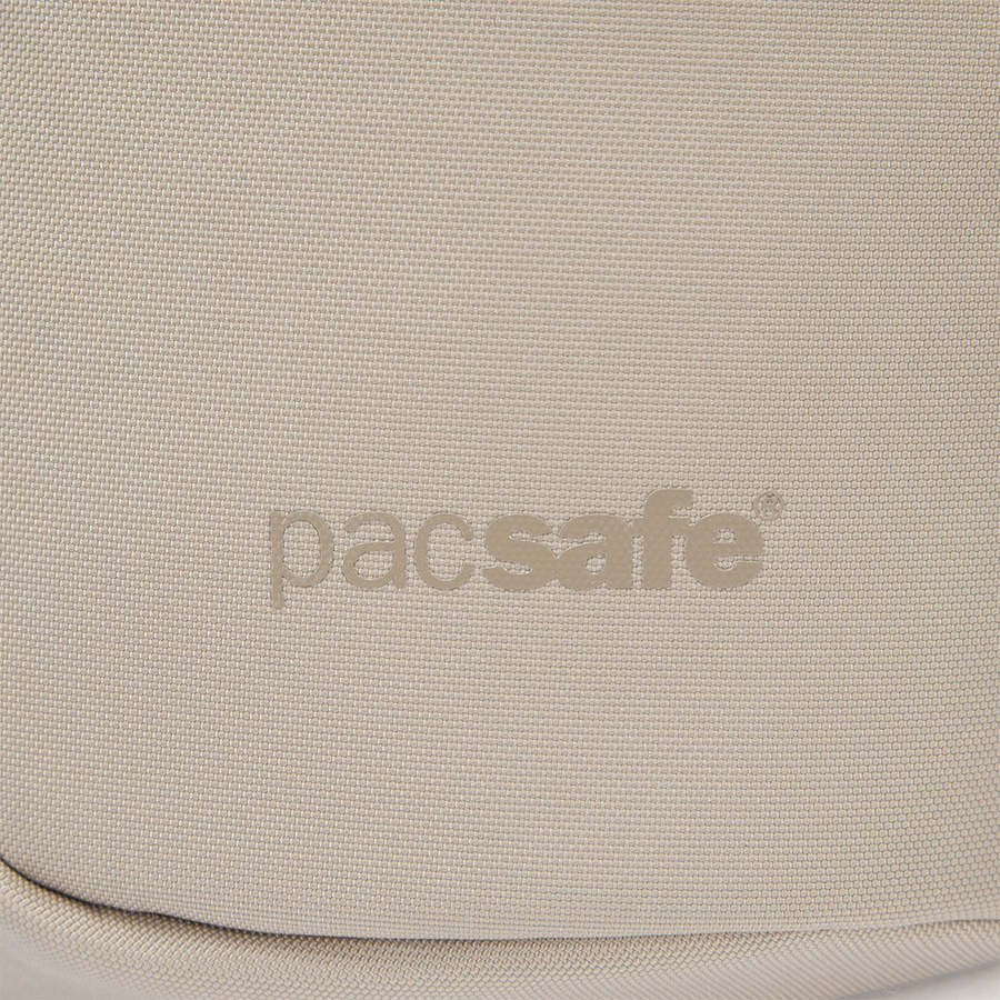 Saszetka plecak antykradzieżowy Pacsafe Vibe 150 - beżowa